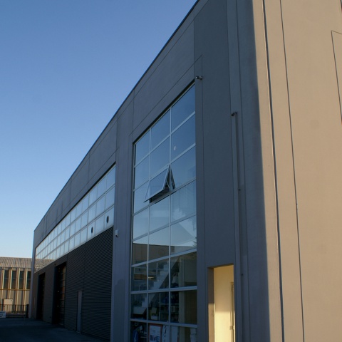 autosalone e magazzino Concessionaria Porsche Cuneo - Ingar Progetti - Insediamento attività polifunzionali